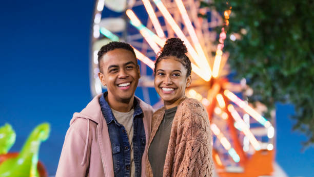 istock Young couple at county fair 1269572383