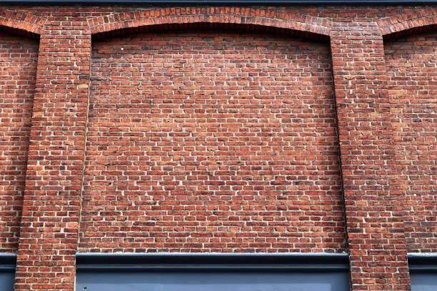istock Old brick wall. Texture of old weathered brick wall panoramic background 1269577947