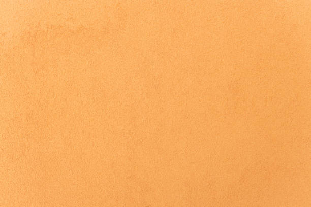 istock The yellow plastered wall with fine texture. 1269581351