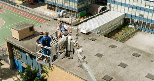 istock The construction team preparing for the high-altitude job using the lifting platform. Harlem, New York City 1269581625
