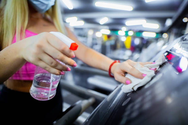 Gym disinfection during Covid-19 Pandemic stock photo