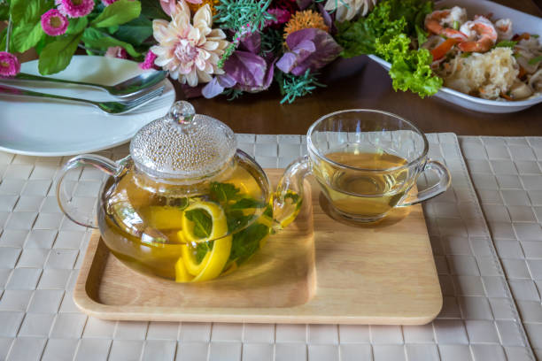 istock Herb tea in glass cup and teapot. 1269594747