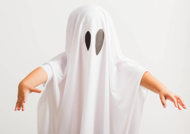 istock little cute child with white dressed costume halloween ghost scary 1269597160