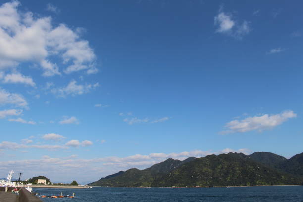 istock Sunny sky and blue sea 1269601020