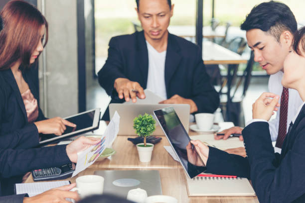 istock Business Partners Giving high five complete a deal. Successful Teamwork Hands Gesture. Partnership Business Concept. 1269607129
