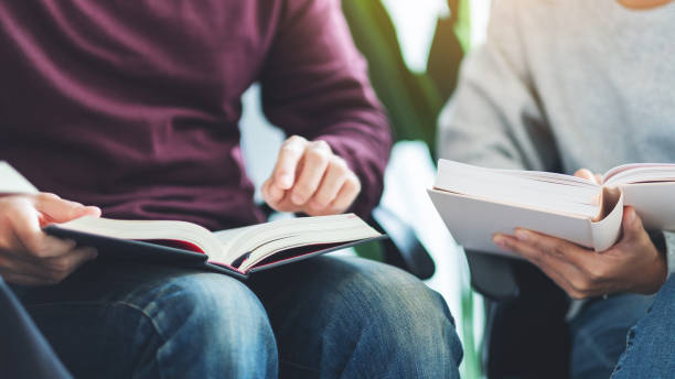 istock Group of young people enjoyed reading books together 1269608901
