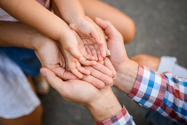 istock view on hands which turned palms up and lie on each other 1269609082