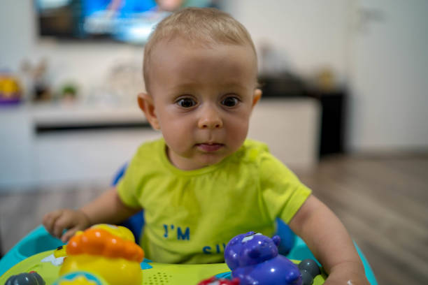 istock Baby in baby walker 1269615410