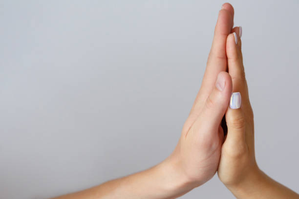 istock Male and female hands on a white background close-up 1269622590