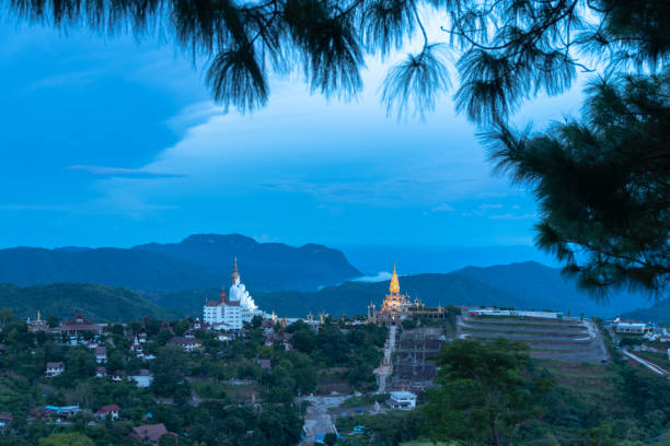 istock 5 sitting buddha statues at wat Phachonkeaw 1269627126