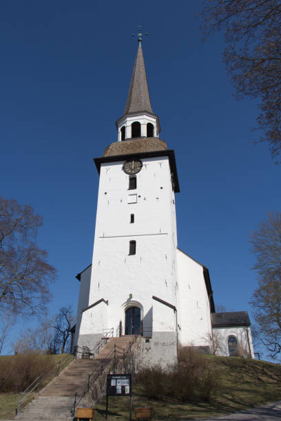 Mariefred Church in a sunny day, Sweden. Mariefred, Sweden - April 20 2019: the exterior view of Mariefred Church on April 20 2019 in Mariefred, Sweden. mariefred stock pictures, royalty-free photos & images