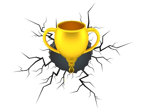 Golden trophy inside cracked hole isolated on white background. 3d illustration