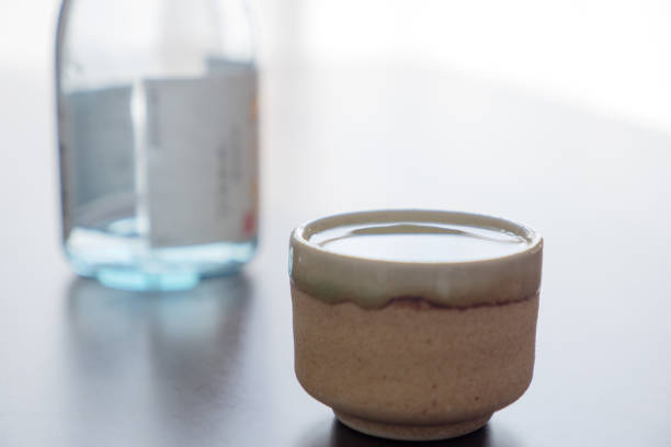 Sake and bottle poured into the mouth