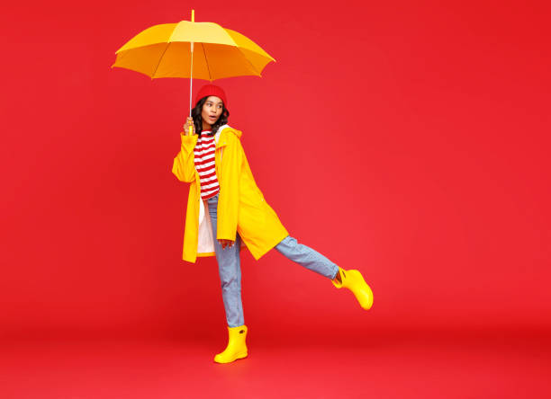 istock Funny ethnic female on rainy day 1269638763