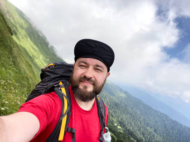 istock Traveler taking selfie in the mountains 1269642768