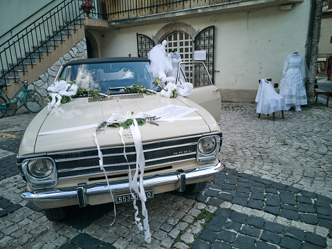 Pescasseroli, Italy - 08 August, 2020: vintage wedding dresses exhibition held in the streets of Pescasseroli old town.