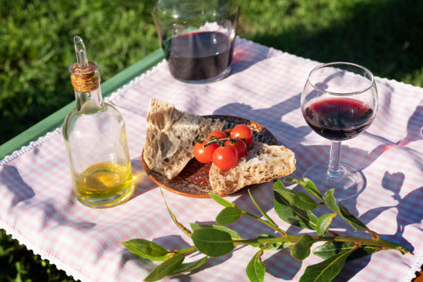 Organic picnic in garden of spanish delicatessen at sunset stock photo