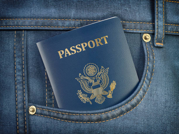 USA passport in pocket jeans. Travel, tourism, emigration and passport control concept. USA passport in pocket jeans. Travel, tourism, emigration and passport control concept. 3d illustration jeans denim passport pocket stock pictures, royalty-free photos & images