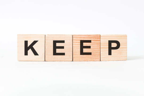 istock words on wooden cubes, white background. business concept 1269651286