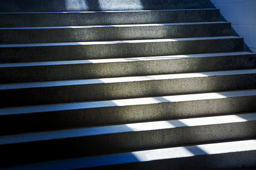 Staircase with sunlight . Stone city stairs