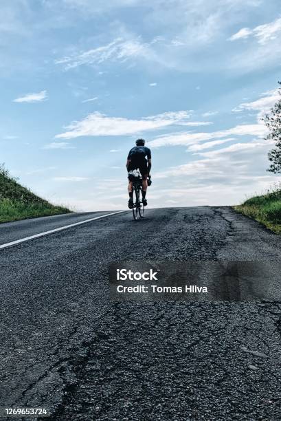 Bikepacking Stock Photo - Download Image Now - Asphalt, 30-34 Years, Active Lifestyle