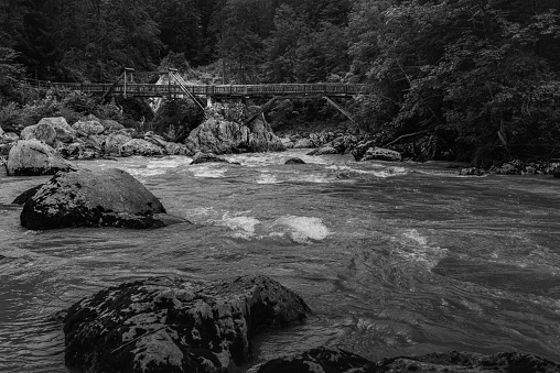 a wooden bridge in the mountains