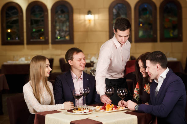 istock Friends at a restaurant drinking red wine. 1269656366