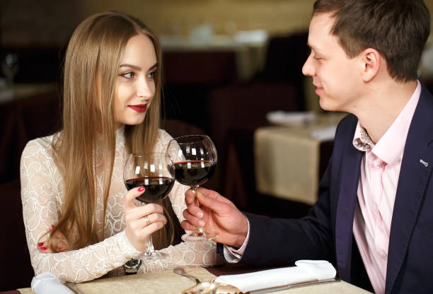 istock Couple toasting wineglasses in a luxury restaurant. 1269656465