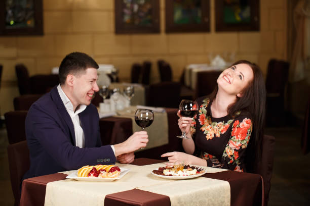 istock Couple toasting wineglasses in a luxury restaurant 1269656519