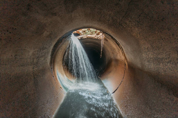 istock Leak of water into round sewer tunnel 1269659484