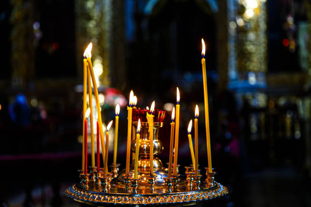 Russian Orthodox church. Burning candle Russian Orthodox church. Burning candle orthodox church easter stock pictures, royalty-free photos & images