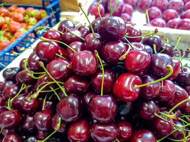 istock Fresh cherries are in a drawer in the store. 1269661513