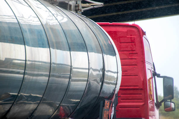 A fuel tanker traveling along a motorway in the United Kingdom