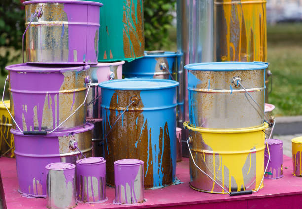 istock The used paint cans. Colorful paint buckets. 1269663889
