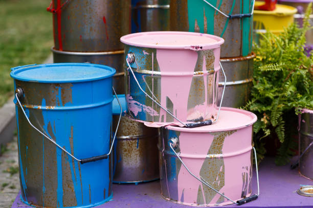 istock The used paint cans. Colorful paint buckets. 1269663903