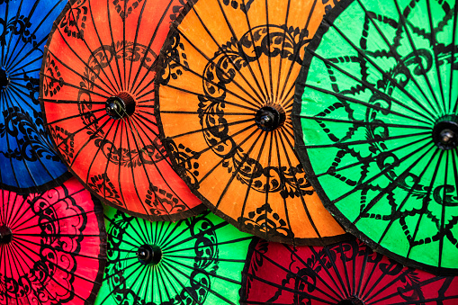 Colorful umbrellas - souvenirs  for sale in the ancient temple of Bagan, Myanmar (Burma)