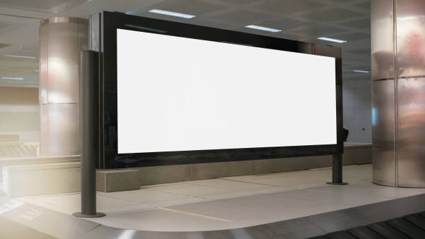 istock big white empty billboard with mockup in airport building advertising concept 1269669151
