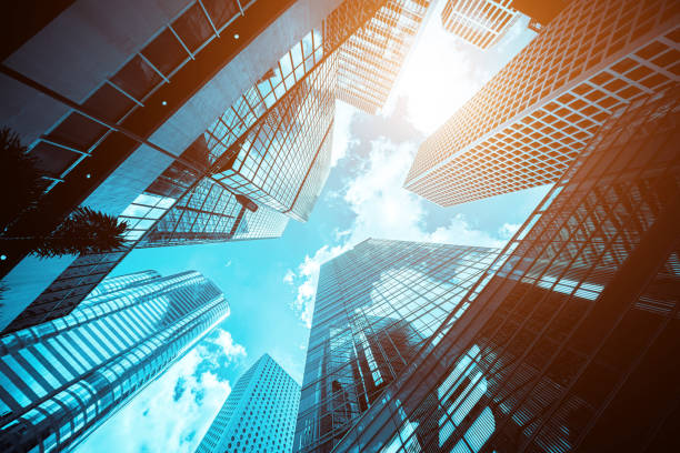 Modern office building close up in sunlight Modern office building close up in sunlight hong kong photos stock pictures, royalty-free photos & images