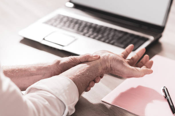istock Businessman suffering from wrist pain 1269676663