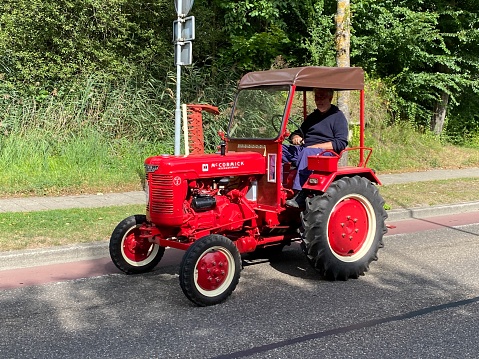 Brunssum, the Netherlands, - August 30, 2020. Vintage tractors moving on during a cultural festival In the country.