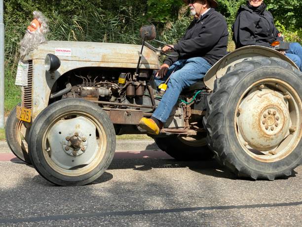 Brunssum, the Netherlands, - August 30, 2020. Vintage tractors moving on during a cultural festival In the country.