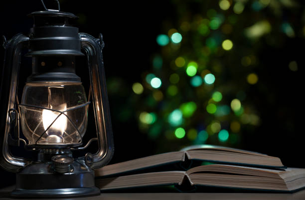 istock image of book lamp dark background 1269680349