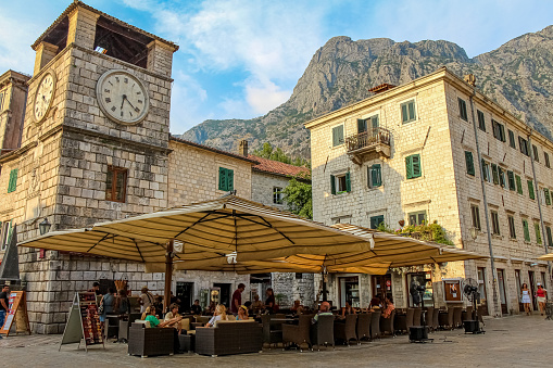 Kotor, Montenegro July 28th 2018: A cafe at the Clock Tower at the Square of Arms, the Old Town of Kotor, Montenegro