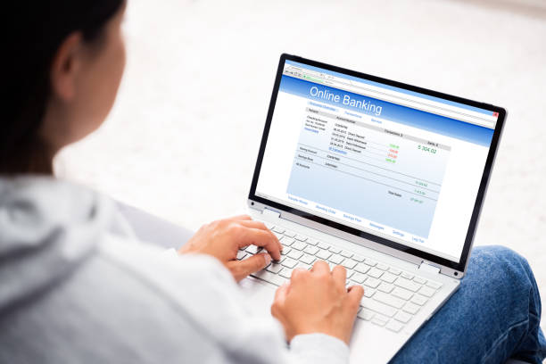 istock Mobile Banking Online On Laptop 1269681667