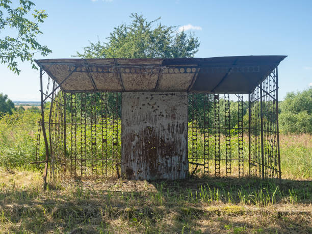istock An old rusty abandoned bus stop in the countryside on a clear summer day 1269682529