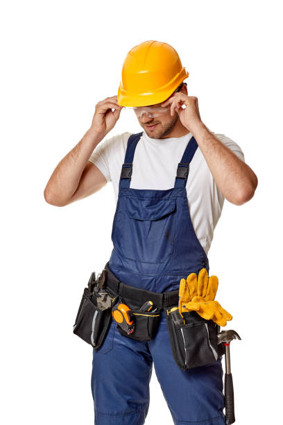 istock repairman worker in yellow hard hat and uniform. 1269687076