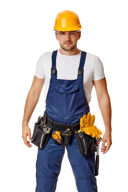 istock repairman worker in yellow hard hat and uniform. 1269687095