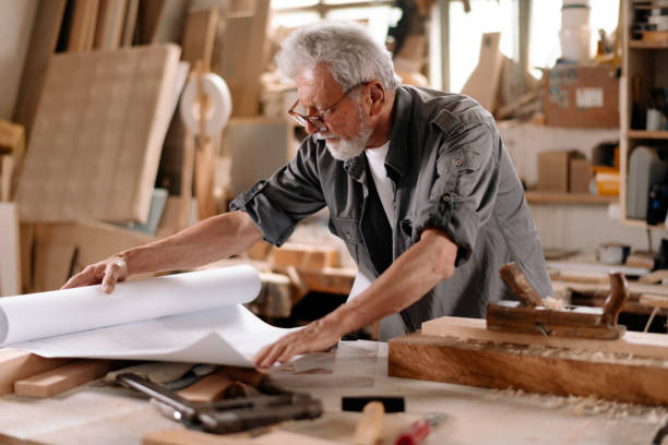 istock Mature carpenter at work stock photo 1269692741