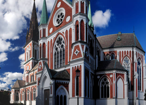 Red-White Coloured Sofia Cathedral In Jonkoping Red-White Coloured Sofia Cathedral In Jonkoping On A Sunny Summer Day With Some Clouds In The Sky jonkoping stock pictures, royalty-free photos & images
