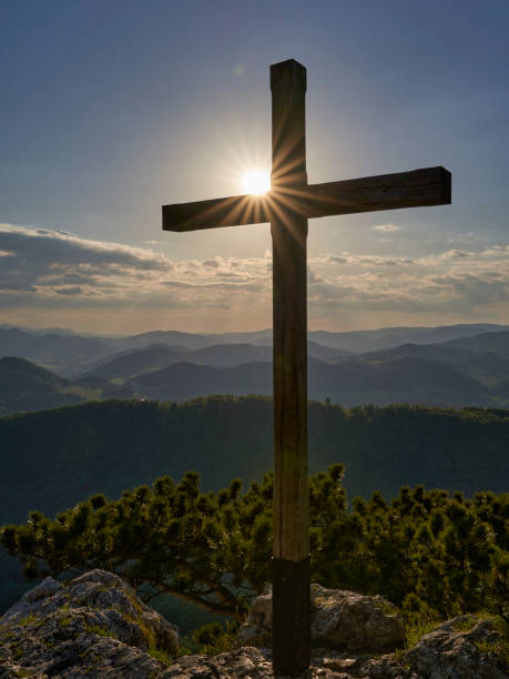 summit cross at sunset mount Peilstein Austria